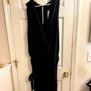 Torrid Romper. Black with gold stripes. Size 4